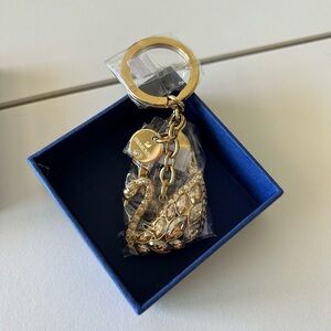 Swarovski swan lake beg charm, gold tone